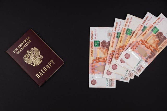 A Russian passport with some Russian money