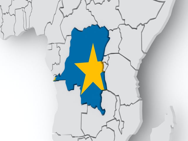 An illustration of the country of DRC highlighted by its flag