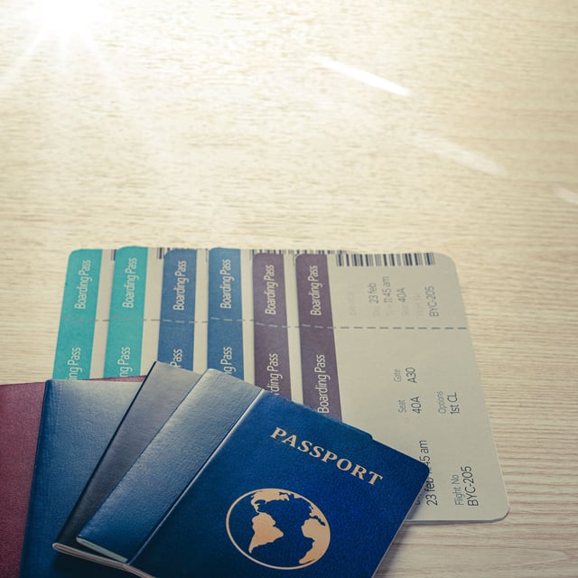 Bunch of passports with multiple boarding tickets