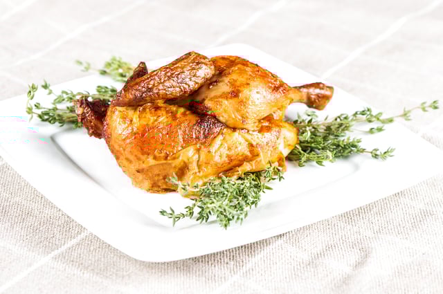 Grilled Bbq Chicken With Thyme Herb On White Plate