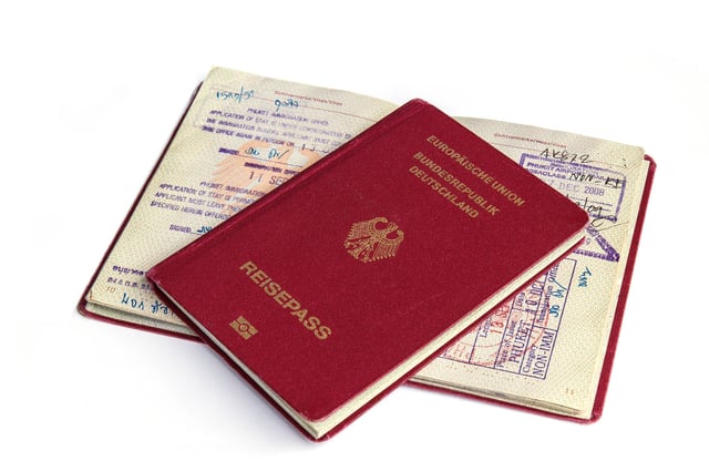 Passports And Visas Isolated On White Background