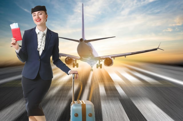 Stewardess In Uniform With Passport Tickets And Suitcase At Runway