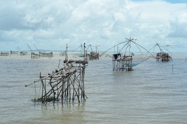 Traditional Fishing Posts Near The Beach