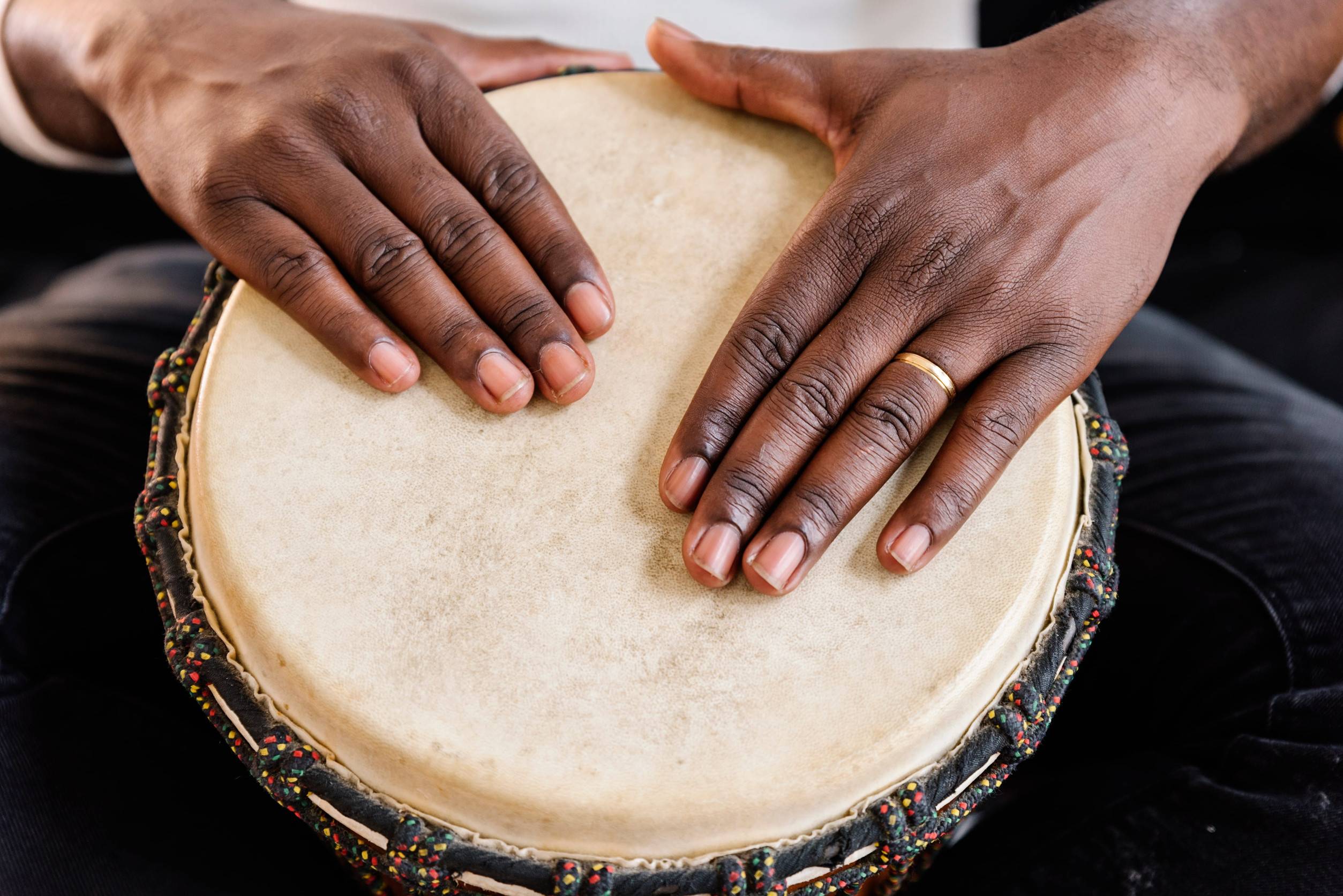 Man Playing A Drum